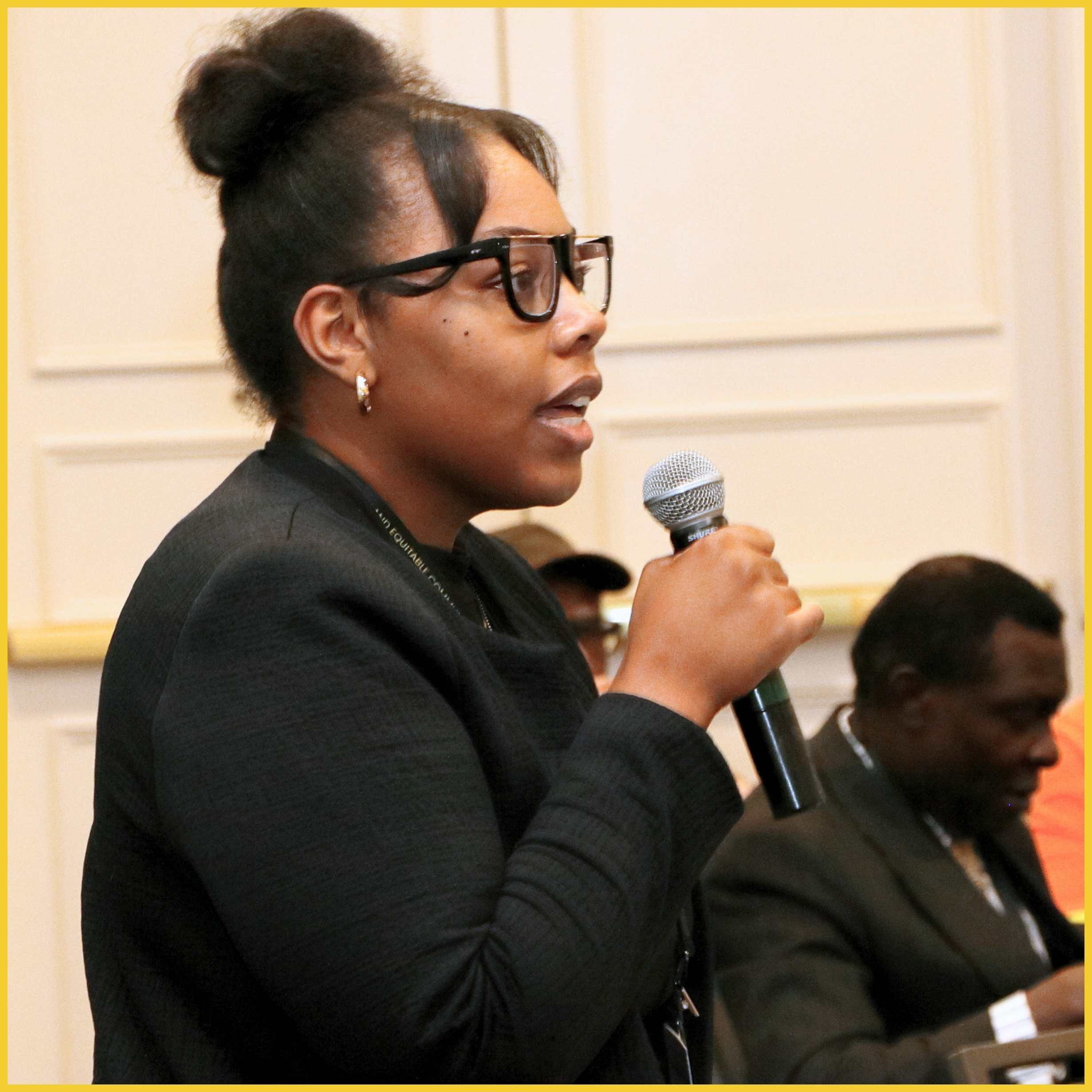 Web Images _1 (2) Woman asking a question and holding a microphone
